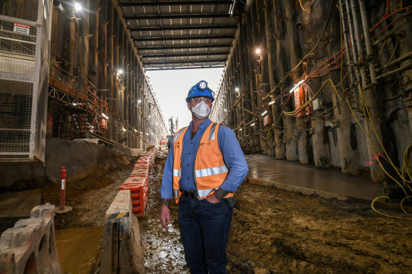 Sam Haynes at the entrance to a ventilation tunnel.