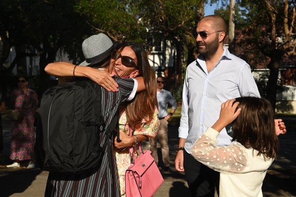 Vittoria Zecchino, 11, says goodbye to her mother Antonella before she starts year 7.