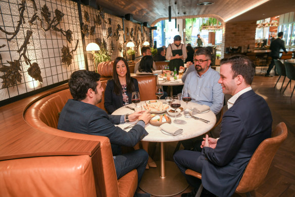 LK chief executive Boris Rozenvasser and his banking associates take time out for lunch