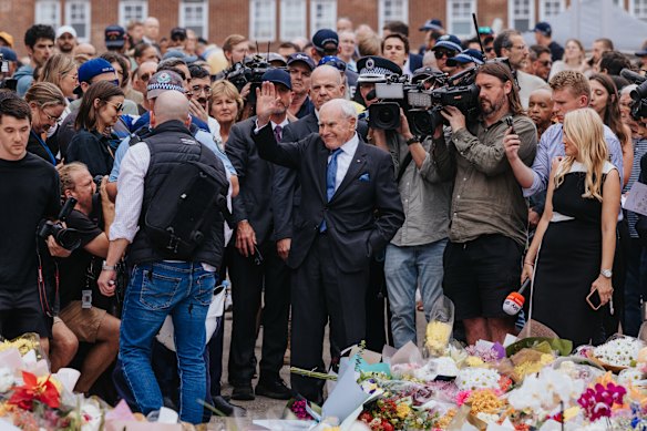 Former prime minister John Howard visits the memorial at Bondi Pavilion for the victims of the terrorist attack.
