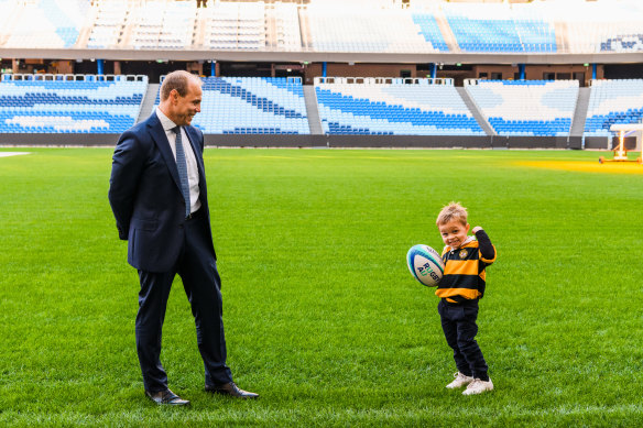 Waugh and his youngest son Arthur on Allianz Stadium after being announced as CEO.
