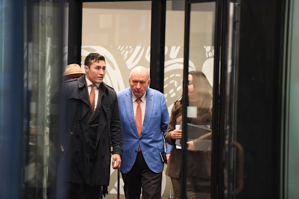 Alan Jones leaves Sydney’s Downing Centre justice complex on Tuesday after the second day of his criminal trial.