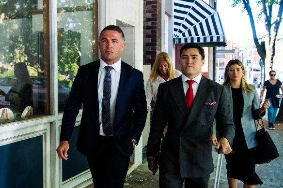 Sam Burgess outside court with his lawyer Bryan Wrench in 2021.
