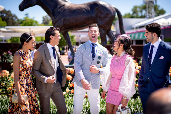 Reality TV celeb Tayla Damir (left), actor Tim Kano, model Kris Smith, MasterChef winner Diana Chan and AFL star Christian Petracca revel in their finery.