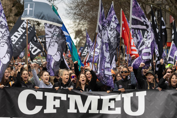 Protesters during their march from Carlton to the Fair Work Commission in Exhibition Street.