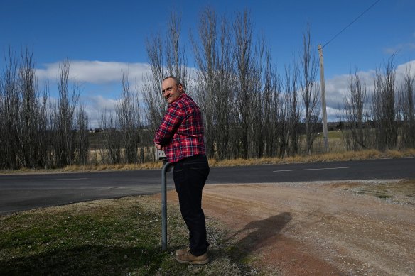 Firefighter and Wallaroo resident Adam Gresham standing at the end of his driveway, across the road from where the school bus stops in the afternoon.