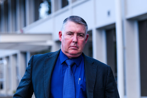 Former NSW Police Sex Crimes Squad detective Glen Coleman leaves Penrith Court on the first day of his rape trial.