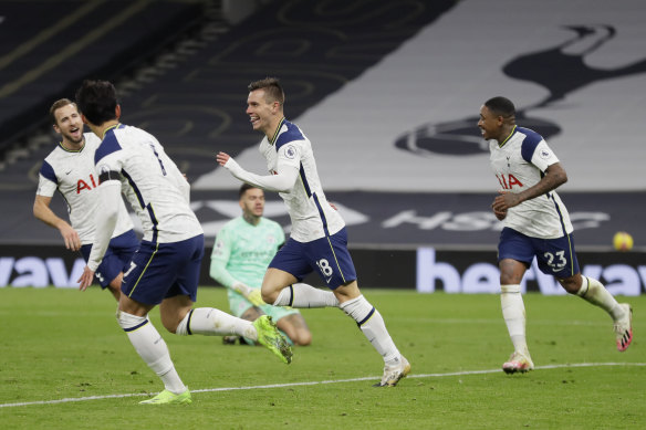 Giovani Lo Celso (second right) celebrates scoring Spurs' second goal.