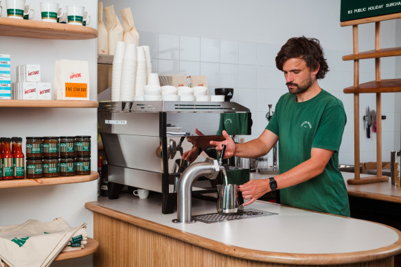 Good Ways Deli barista Tom demonstrates the Udder Way milk keg system.