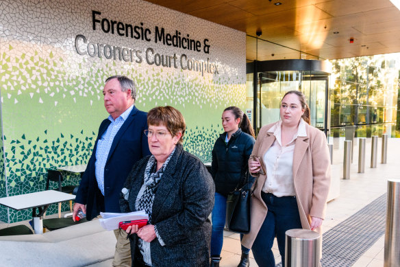 Philippa and Peter Fitzpatrick leave Lidcombe Coroner's Court with their daughters Amanda (left) and Emma on Monday.