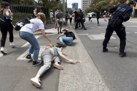 Students and staff were pushed to the ground at the protests on Wednesday.