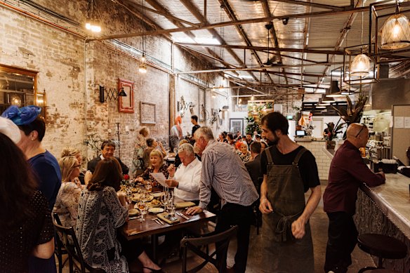 Miss dimly lit spaces thronging with strangers? 