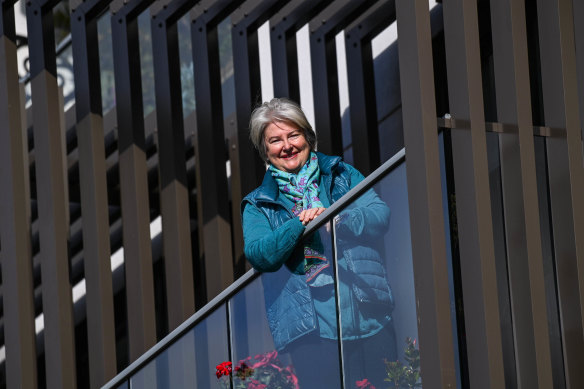 Susie White on her balcony at her Hawthorn East apartment.  