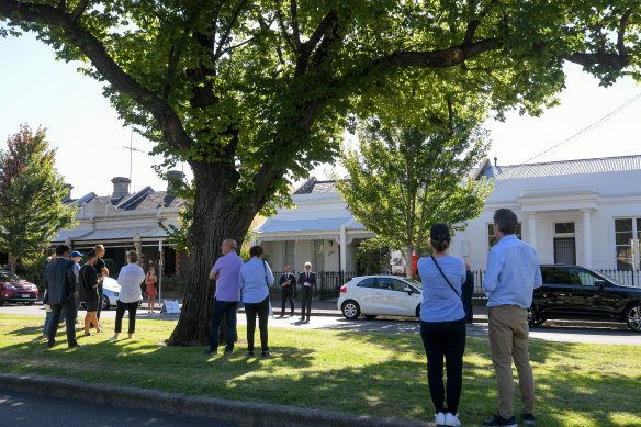 Public auctions often draw keen interest from the neighbours. 