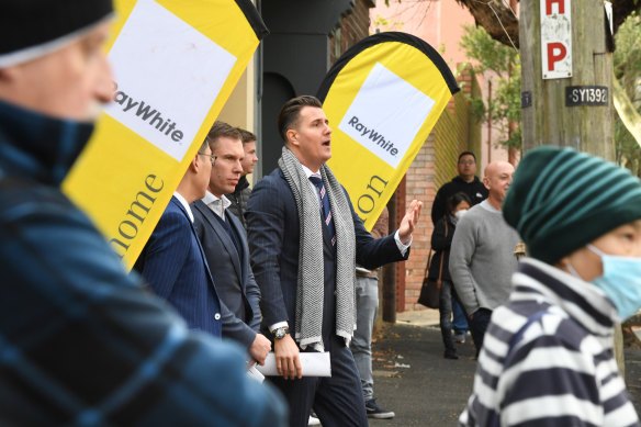 Auctioneer James Hurley had 19 registered bidders at the auction of 106 Cooper Street.