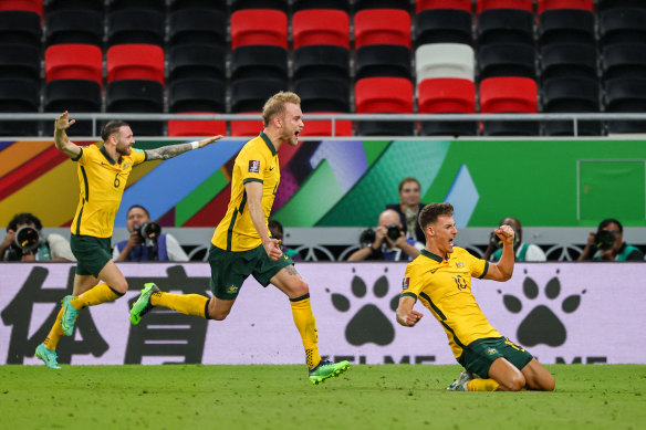 Australia’s Ajdin Hrustic scores the winner against the UAE, setting up a play-off against Peru.