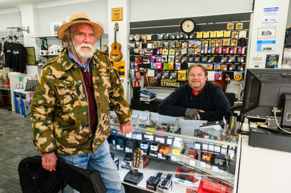 Victor Smith and Mark Hawkins at the High Street Music store, Lithgow, run by Hawkins.