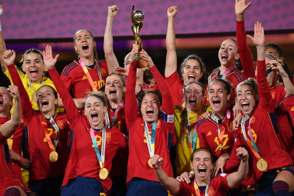 Spain lift the World Cup trophy.