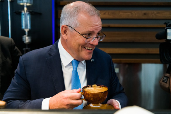 Scott Morrison visits a cafe in the seat of Forde, Queensland.
