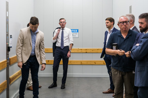 Then-NSW premier Dominic Perrottet takes the goods lift after a live debate against then-opposition leader Chris Minns in the Channel Nine studios on March 15, 2023, during the state election campaign.