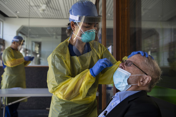 Ruby Princess cruise ship passenger Michael receives his second COVID-19 test at St Vincent's Hospital.