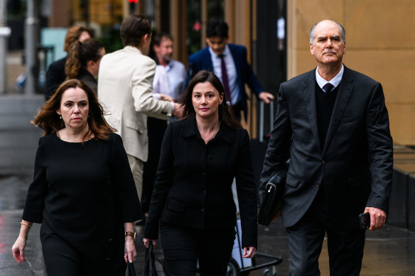 Former Super Retail Group chief legal officer Rebecca Farrell (left), former company secretary Amelia Berczelly (centre) and their lawyer Michael Harmer are locked in a legal battle with the retailer.