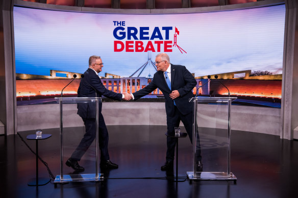 Prime Minister Scott Morrison and Opposition Leader Anthony Albanese shake hands before the debate.