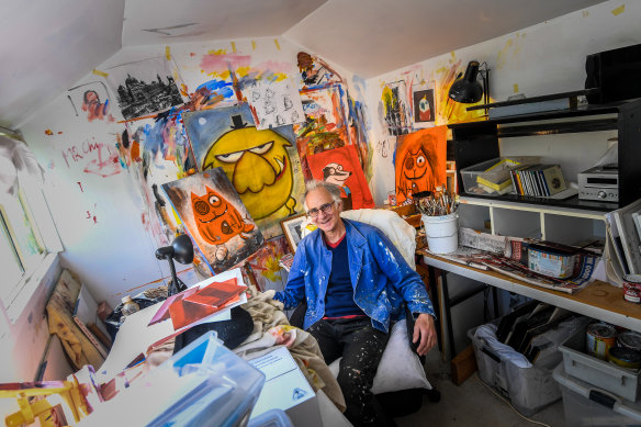 Hobbs in his fabulously cluttered studio, where he works only in pen, ink and paint.