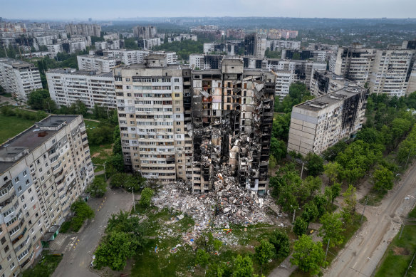 In an aerial view, uninhabitable apartment buildings stand in a former frontline neighborhood on May 21, 2022 in Kharkiv.