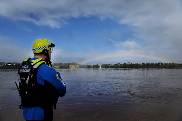 VRA Rescue NSW Regional Operations Manager Kile Nicholas looks at a rainbow over the Manning River at Croki.