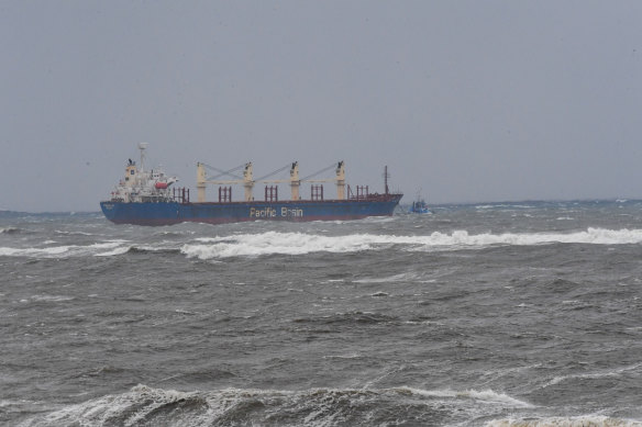 The damaged cargo ship Portland Bay was towed to Port Botany on Wednesday.
