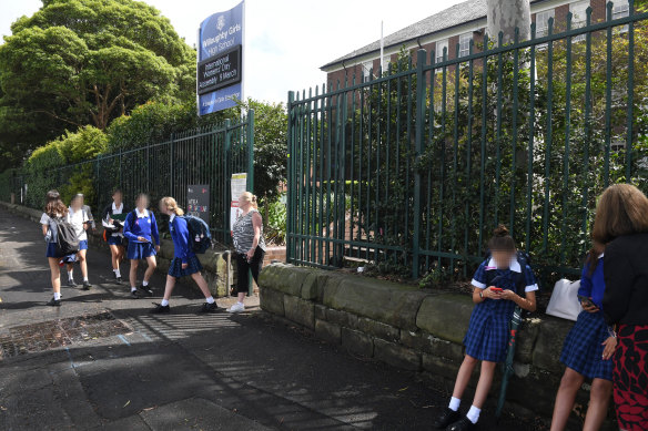 Students leaving Willoughby Girls High on Monday morning after a case of coronavirus was identified in the school.