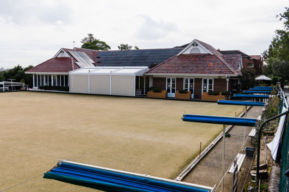 The bowling green and the pavilion, pictured with its shutters down.