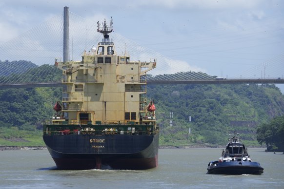 A cargo ship sails near the Pedro Miguel Locks on Panama Canal in Panama City.