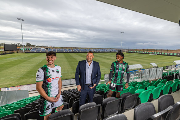 Western Melbourne Group chairman Jason Sourasis (centre), pictured with Western United footballers Jake Najdovski (left) and Abel Walatee.