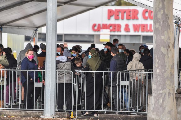 Queue for testing in Shepparton as authorities scramble to contain a 46-case outbreak – including 14 new cases. 