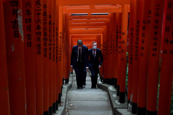 NSW Premier Dominic Perrottet (right) during a visit to the Hie Shrine  in Tokyo on Thursday.