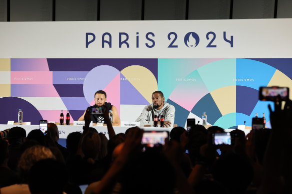 Steph Curry and Kevin Durant front the media in Paris on Thursday.