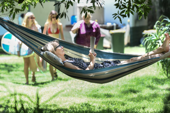 A guest relaxes at Don Hearn’s Cabins on the South Coast last week.