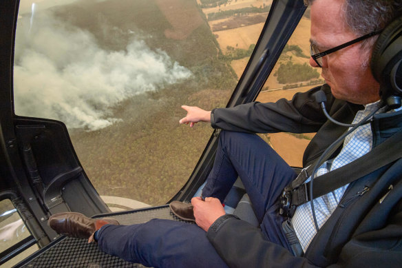 Victorian Premier Daniel Andrews flies in helicopter over the East Gippsland fires in Victoria, New year's Day. 