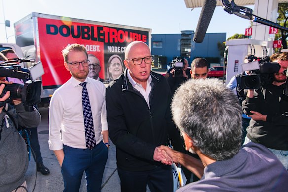 James Paterson (left) visits a service station with Peter Dutton during the election campaign.