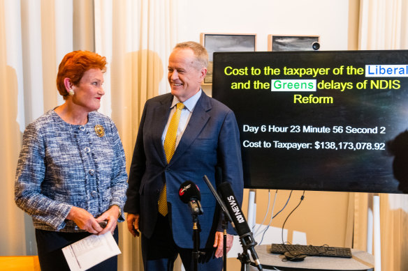 An unusual pairing … Pauline Hanson with Bill Shorten in his ministerial office.
