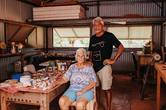 Sibosado with his mum Caroline Sibosado, also an artist, inside his bush shed, where he makes LED sculptural installations and prints.