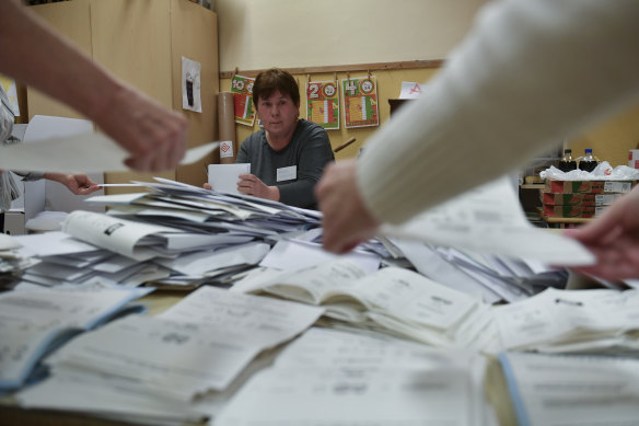 Ballots are counted in the general election in Budapest, Hungary. A referendum on LGBTQI+ rights was also part of Sunday’s vote. 