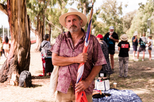 Former service worker Paul Kelly has travelled to Canberra to protest against mandatory vaccination so he can “get back to helping people”.