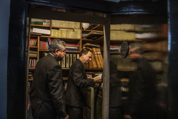 Ken Shelston of Waverley Cemetery and John Wakefield, mayor of Waverley, in the fireproof vault where historic records, including the right of burial certificates are kept. 