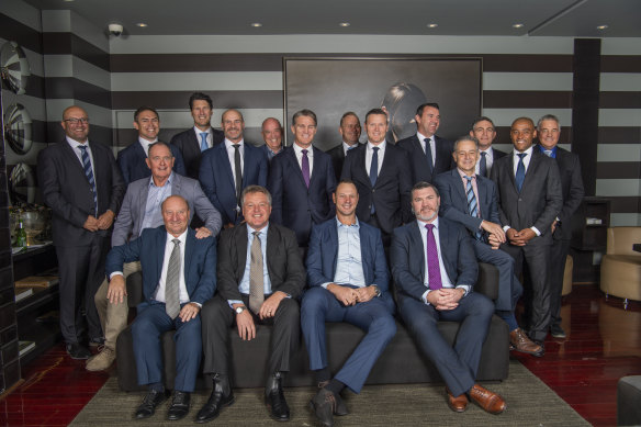 Members of Australia's 1999 Rugby World Cup winning team at a reunion at The Westin Hotel, Sydney. Back row (l-r): Ben Spindler, Scott Staniforth, John Eales, David Wilson, David Pembroke, Tim Horan, Rod Moore, Matt Burke, Joe Roff, Rod Kafer, George Gregan, Rod Macqueen. Front (l-r): Steve Nance, Greg Craig, Andrew Blades, Matt Cockbain, Daniel Herbert, John Best.