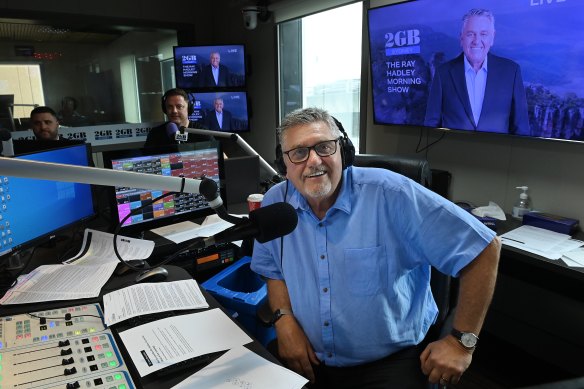 Ray Hadley as he announces his resignation from 2GB with his son Daniel (left) and breakfast presenter Ben Fordham. 