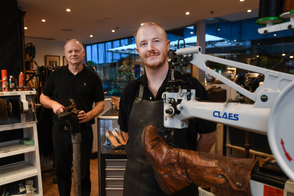 John Coburn, left, owner of The Cobblers Last and cobbler Harrison Canton said there were definitely more people around.  