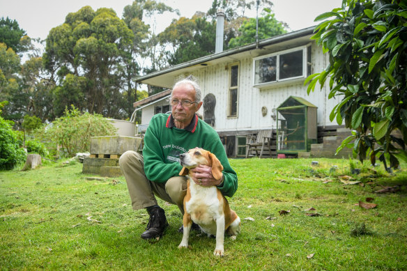 Maurice Eagle, with his dog Holly, at home in the Macedon Ranges shire near Melbourne.